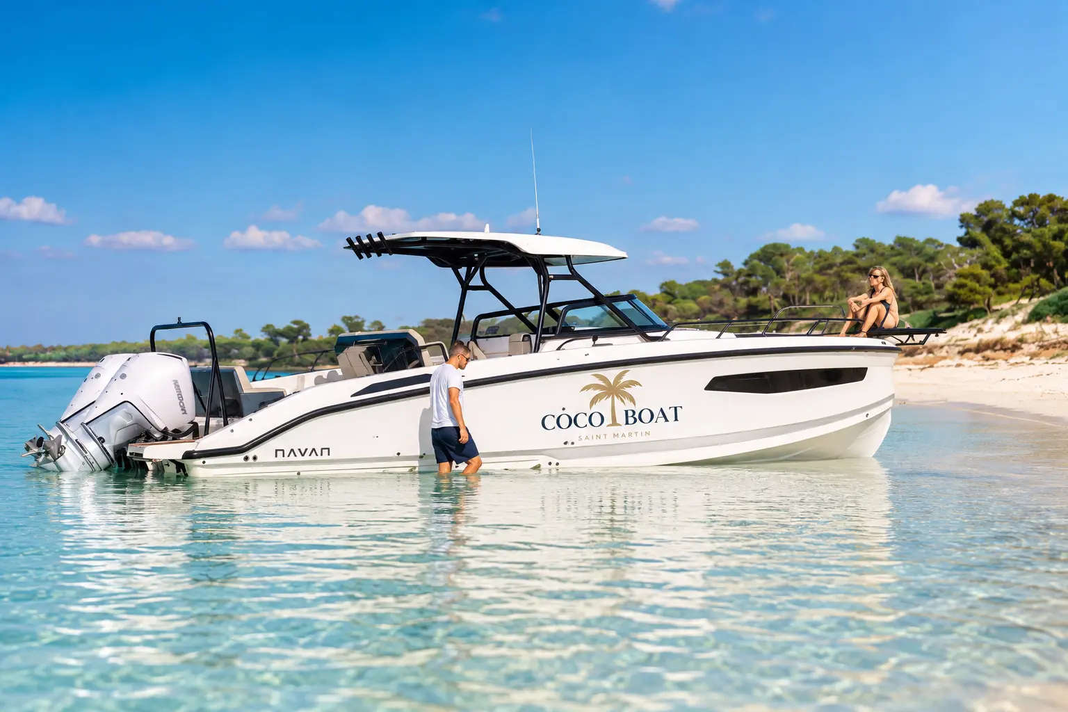Caribbean beach and premium white powerboat