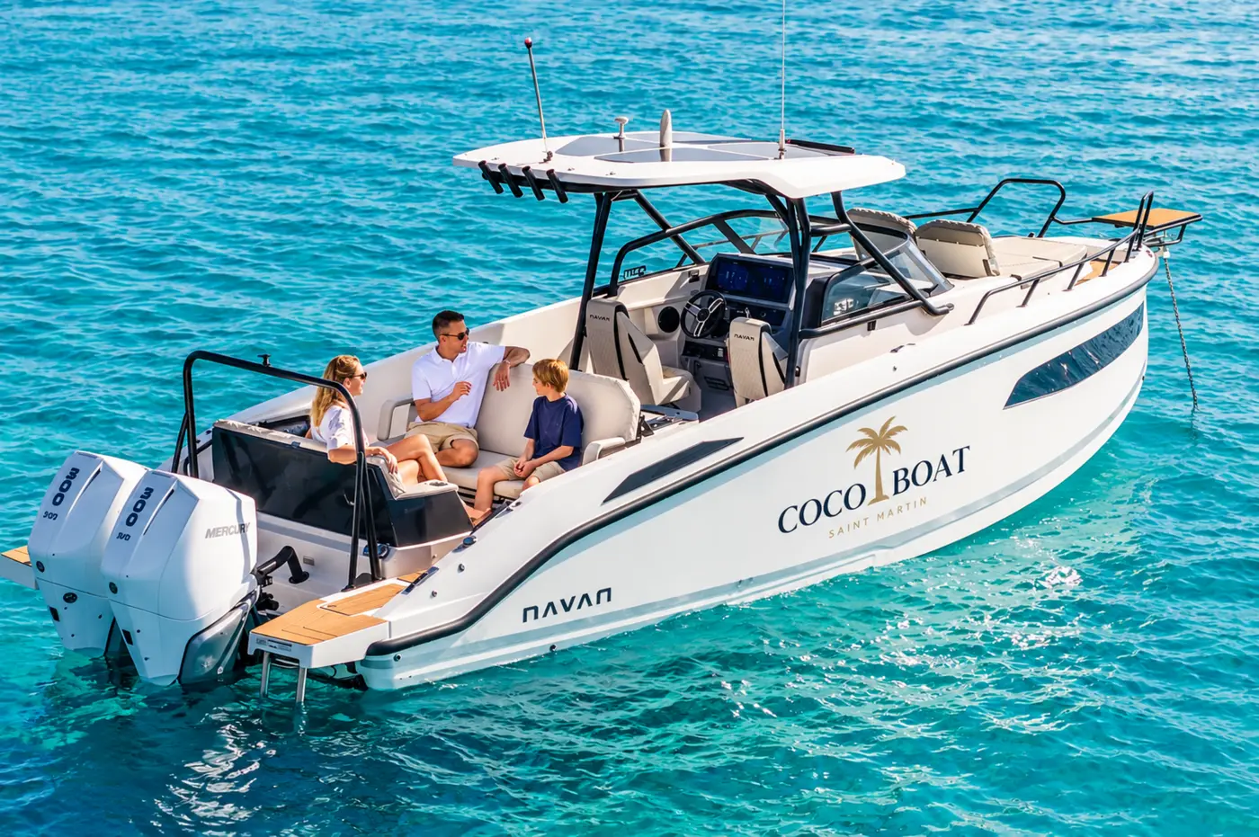 Branded COCO BOAT over turquoise water
